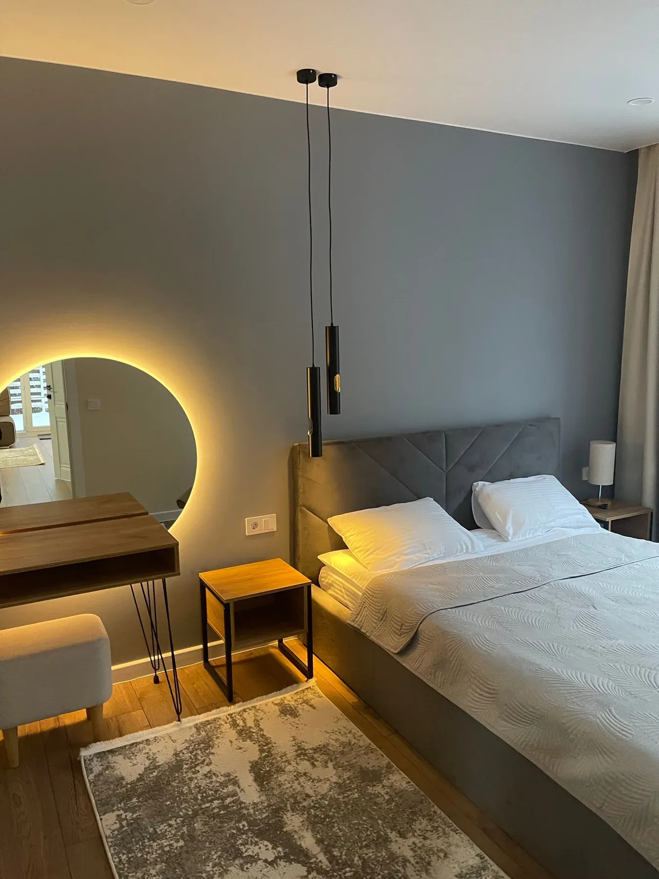 Grey bed with bedside tables and a dressing table — reference image for the MEHTAB dressing table & mirror