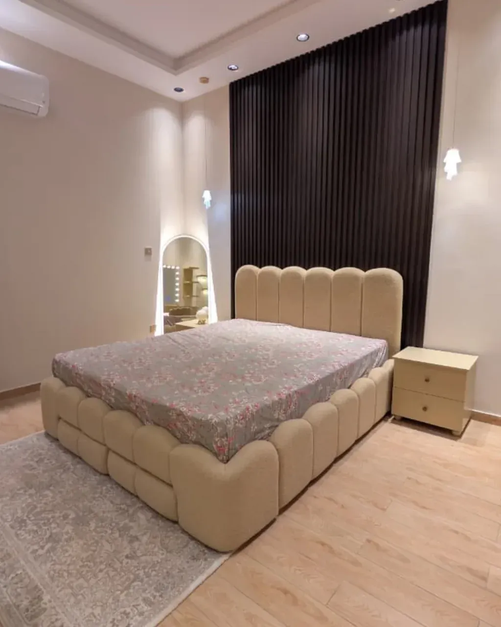 LEHAR Boucle Bed with Side Tables, wide view from the opposite corner