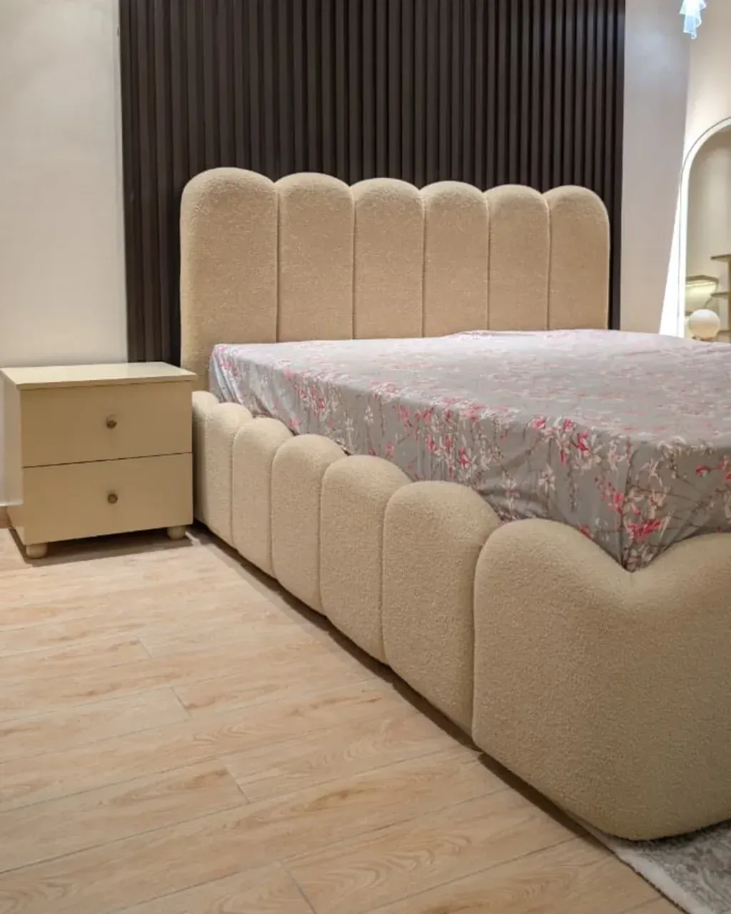 LEHAR Boucle Bed with Side Tables, closer side view with one side table