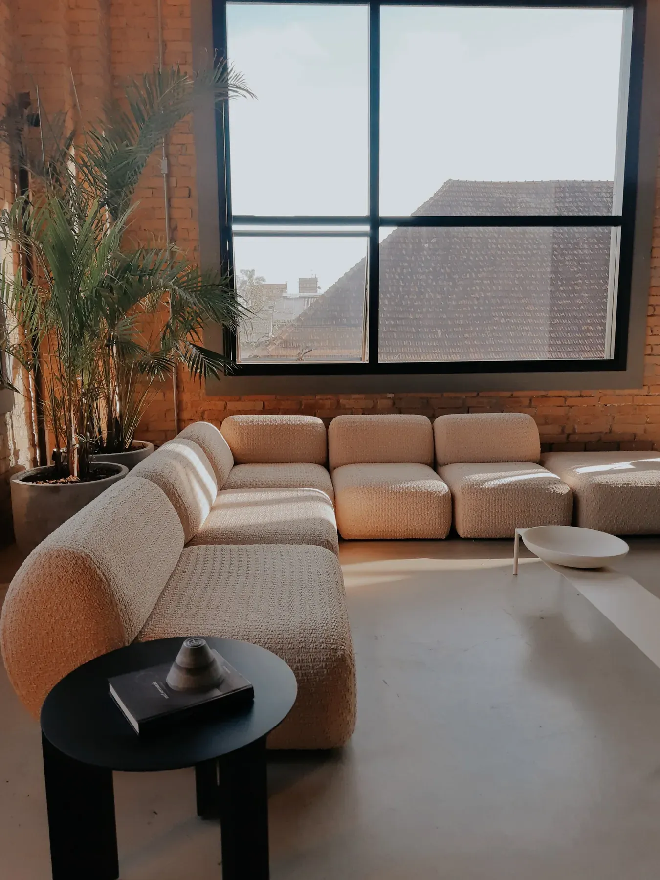 Cream modular sectional sofa in a sunlit lounge — reference image for the CHANDNI modular sectional sofa