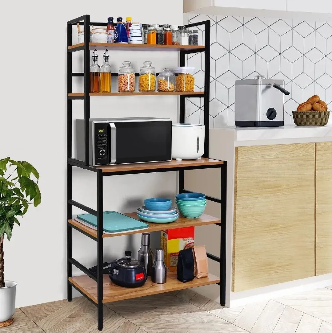 Tall kitchen rack with a black metal frame and wood-look shelves holding a microwave, jars and crockery — reference image for the SALIQA rack